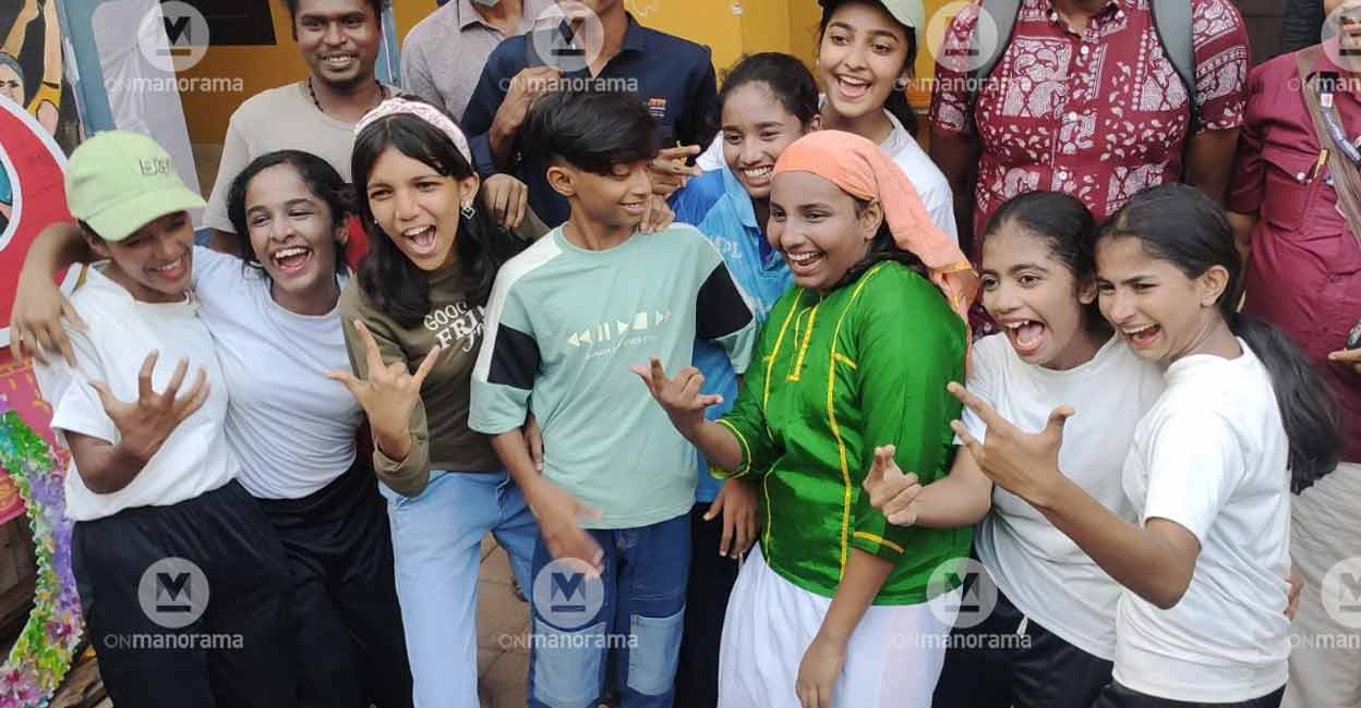 drama-team-boundary1 Students of Memunda Higher Secondary School of Vadakara cheer for the camera after a power-packed performance in the theatre competition at the State School Festival in Kozhikode on Friday. Photo: Manorama