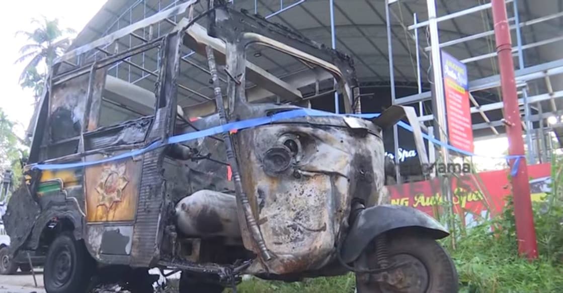 auto-fire-kannur Autorickshaw that caught fire leaving two dead in Kannur. Photo: Manorama News