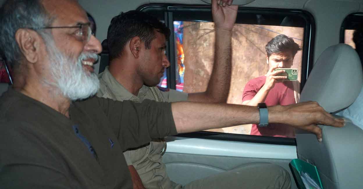 Founder and Editor-in-Chief of NewsClick Prabir Purkayastha is brought to Delhi Police Special Cell in New Delhi, India, Tuesday, Oct. 3, 2023.  Photo: AP/Dinesh Joshi