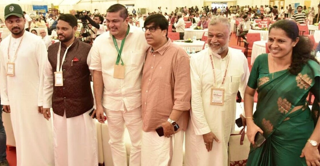District Panchayat President PP Divya (right) with delegates who attended the NRI Summit in Kannur on Wednesday. Photo: Facebook/@ppdivyakannur