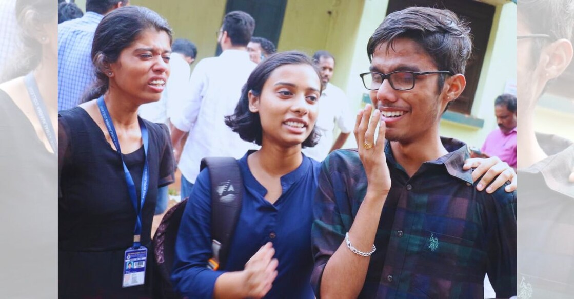 An emotional Sreekuttan Sivadasan (right) is congratulated by his friends. Photo: Special arrangement