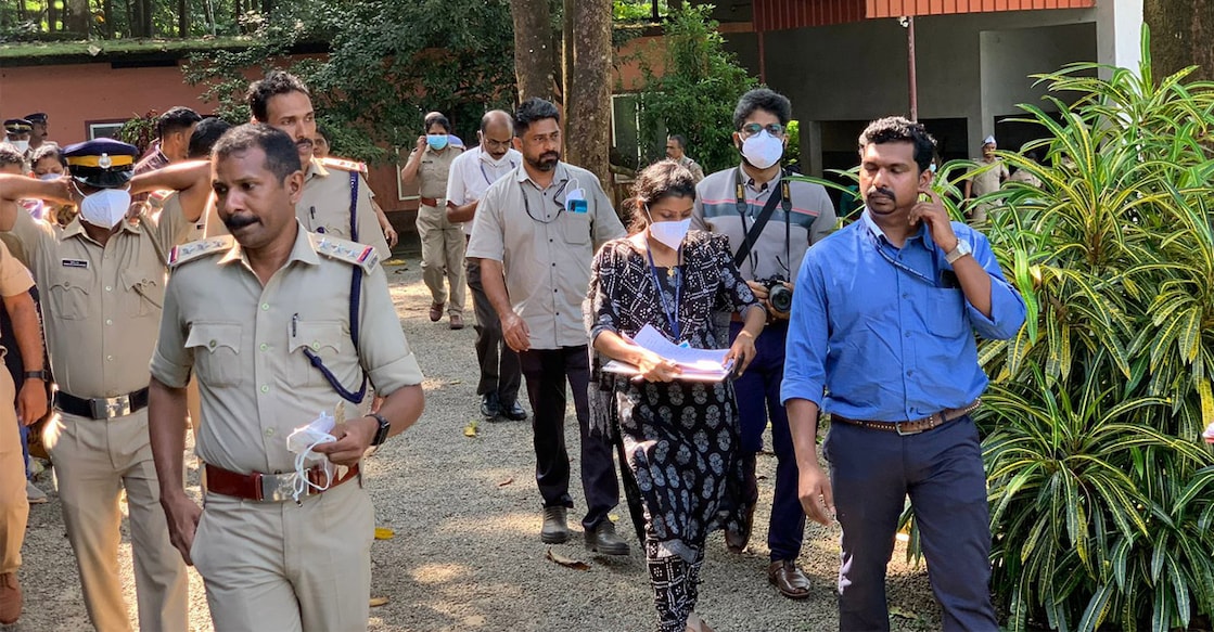 Areacode police and police surgeon Dr Ajesh P P at St Mary's graveyard in Panampilavil. Photo: Special Arrangement