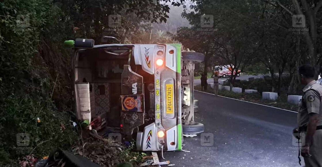 bus-sabarimala-accident The bus carrying Andhra natives overturned on the road between Laha and Puthukada. Photo: Manorama