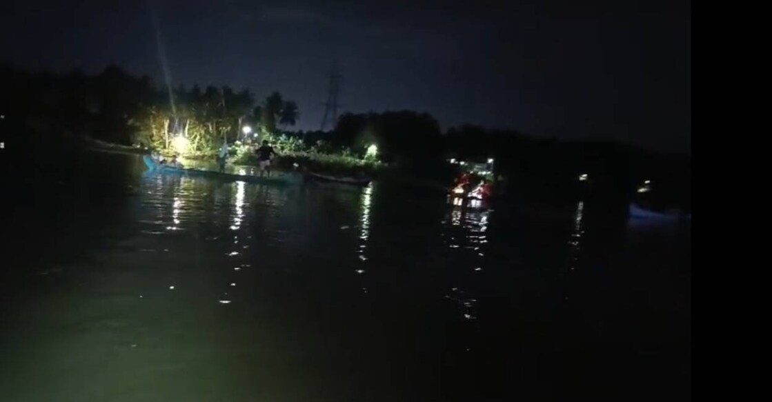 chaliyar-drowning Local residents, police and fire force personnel carried out a search in the river for the two who went missing. Photo: Special Arrangement