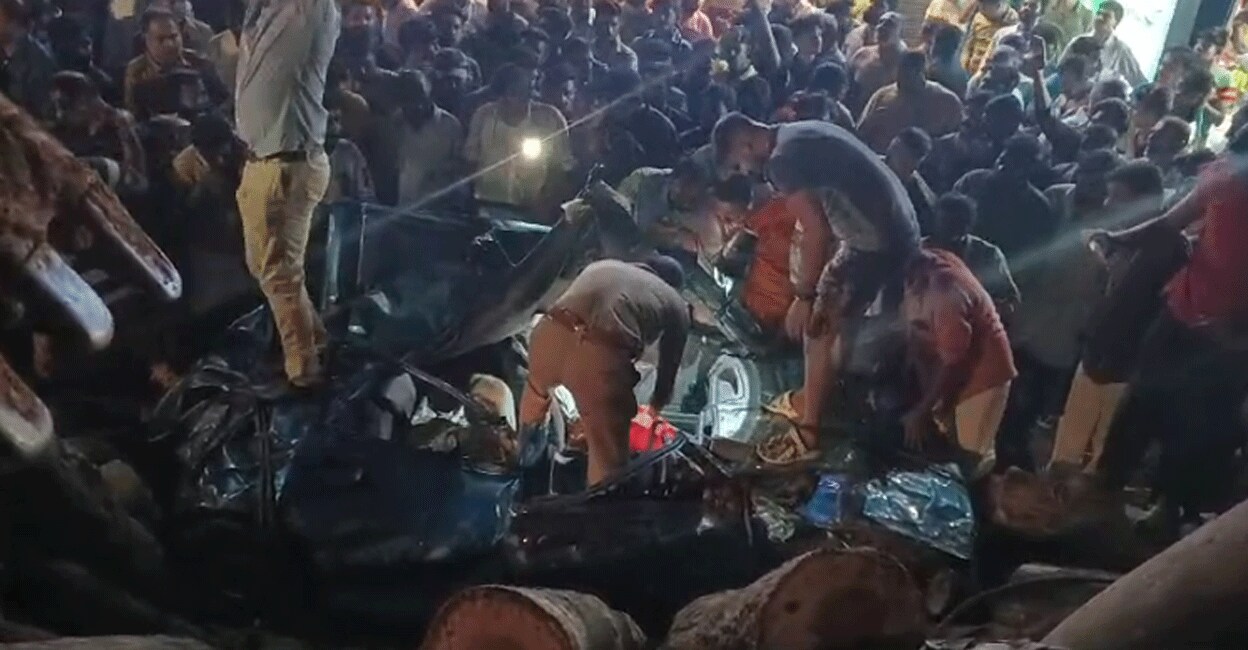 Fire & Rescue personnel and local residents undertake the rescue operation. Photo: Screengrab