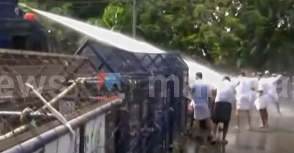 Police use water cannons to disperse Youth Congress protesters in Kozhikode. Video Grab: Manorama News
