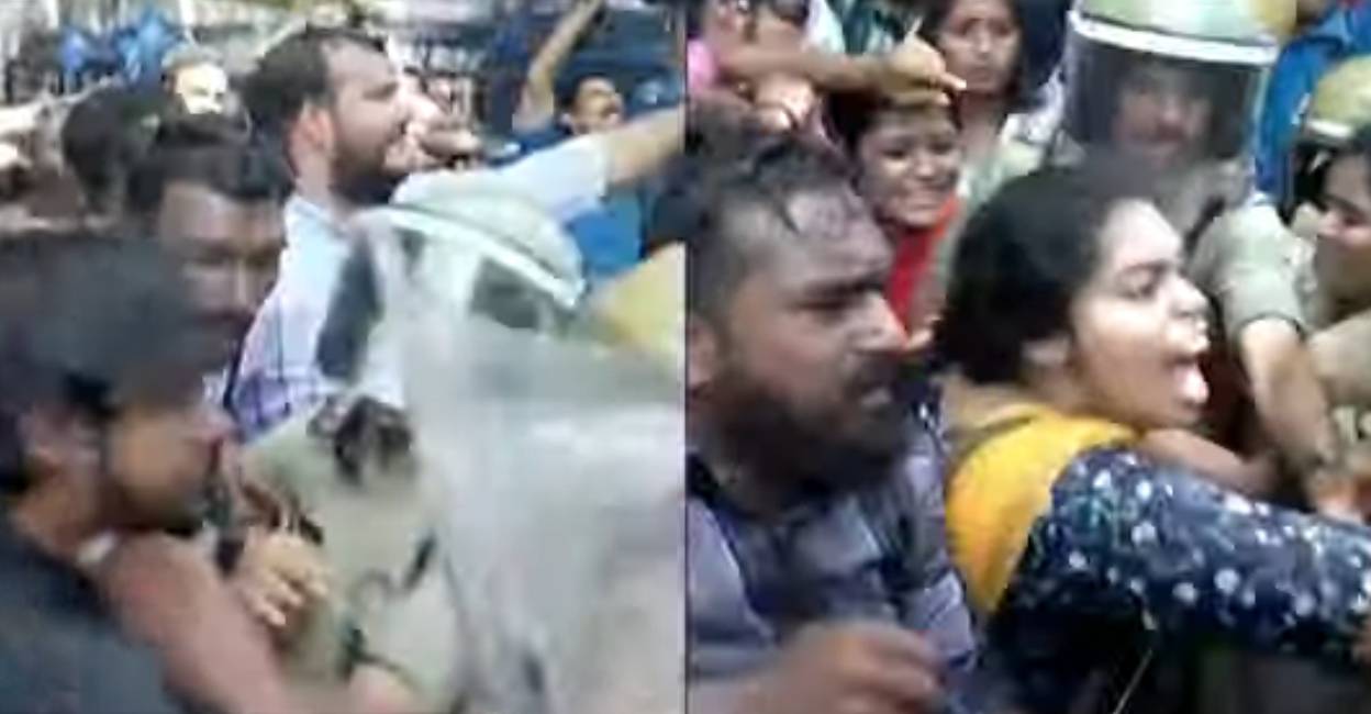 ksu-protest-tvm-c n the visuals aired on the news channels, a cop was seen hitting the woman protester's face with his lathi. Photo: Manorama News
