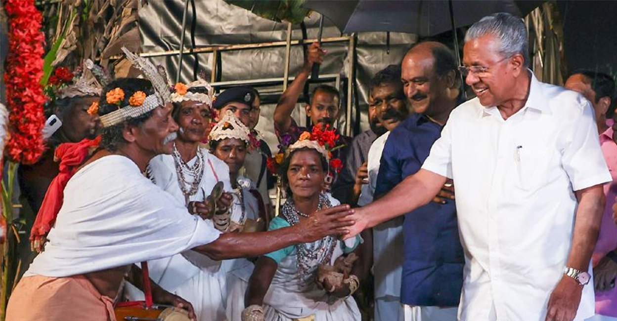 Kerala Chief Minister Pinarayi Vijayan (R) greets performers in Keraleeyam. Photo: Manorama News