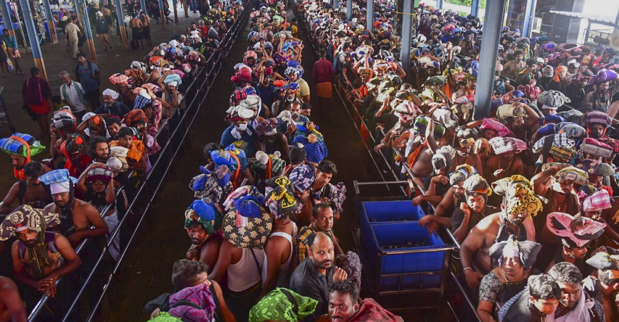 Pilgrims line up to have darshan at Sabarimala temple. Photo: PTI