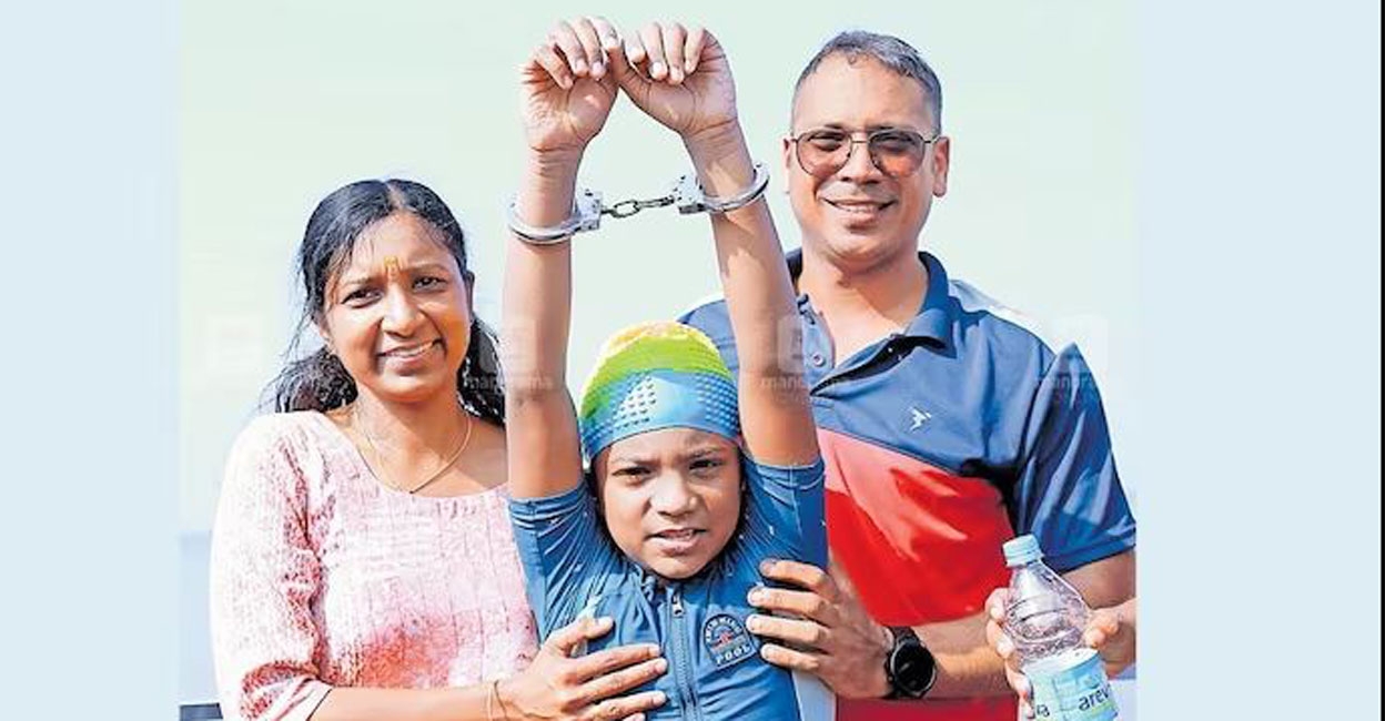 Abhiav with his parents Sujith Kumar and Divya. Photo: Manorama