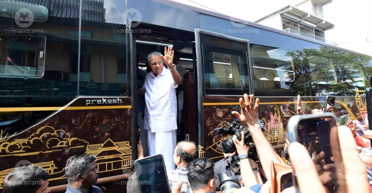 Chief Minister Pinarayi Vijayan waves at supporters from the Nava Kerala Sadas bus. File photo: Manorama