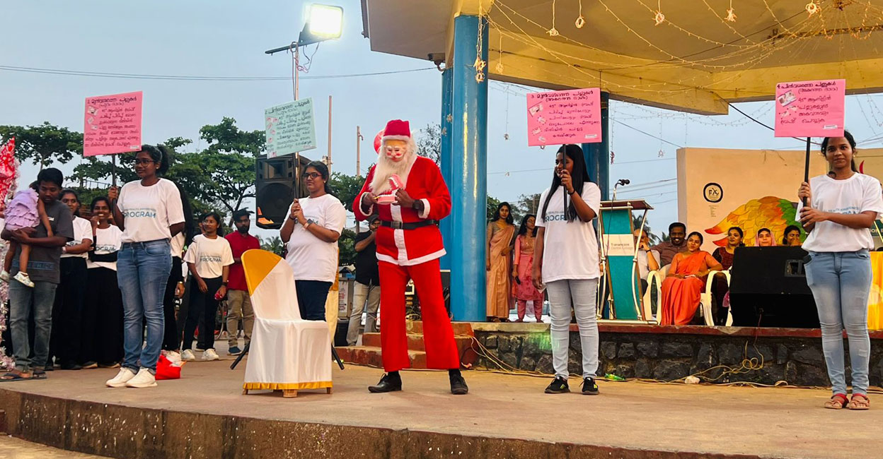 Santa Claus delivering a dental awareness message at a beach in Kollam. Photo: Special arrangement
