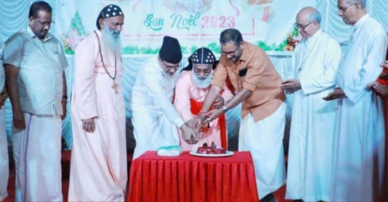 panakad-sadiqali-thangal-k-surendran-xmas-celebrations Panakkad Sadiqali Shihab Thangal and BJP state president K Surendran cut a cake as part of the Christmas celebrations of the Kerala Catholic Bishops' Council. Photo: Special Arrangement