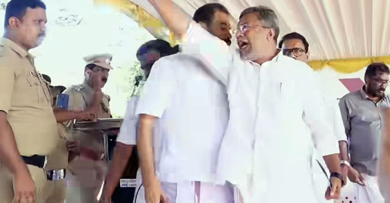 kannur-mayor-councillor Development Standing Committee Chairman P K Ragesh (right) interrupts Mayor T O Mohanan. Photo: Screengrab