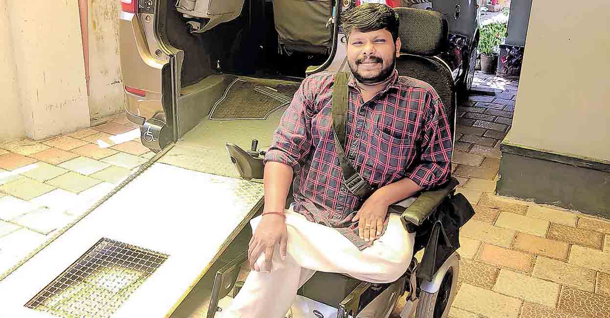 The wheelchair is the driving seat in the car, and at the office, the same wheelchair doubles up as Dileep Kumar's chair. Photo: Manorama