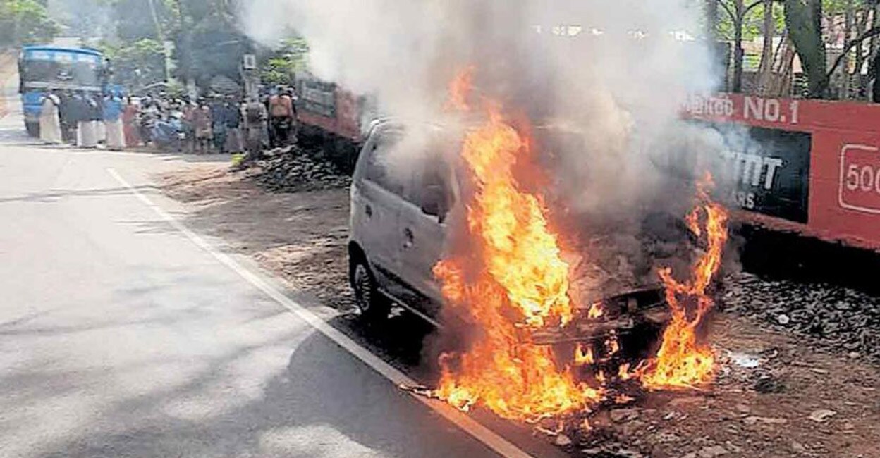 Fire engulfed the front part of the vehicle on Venjaramoodu-Attingal Road. Photo: Manorama Online