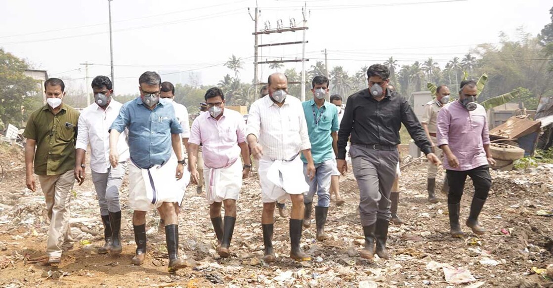 Industries Minister P Rajeeve and Local Self-Government Department Minister MB Rajesh during their visit to the Brahmapuram waste plant to assess the situation Photo: Facebook/Ernakulam Collector