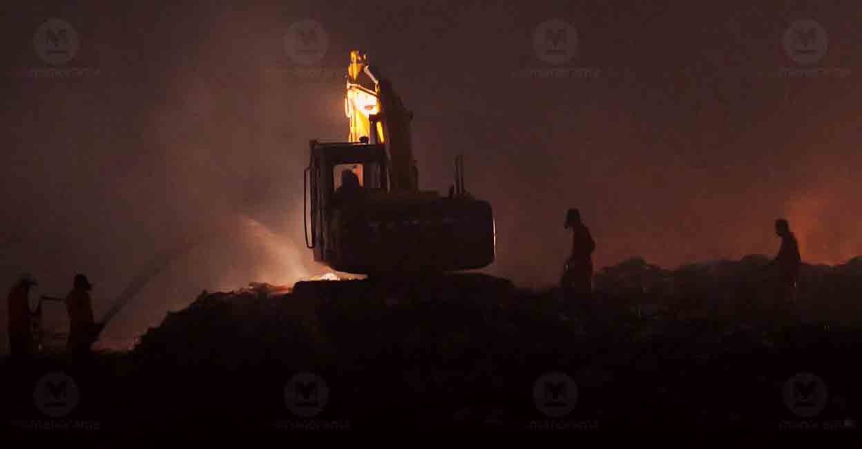 brahmapuram-fire Fire and Rescue team tries to douse the fire at Brahmapuram waste plant paast midnight. Photo: Manorama