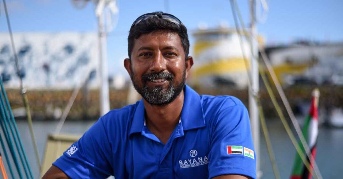 Abhilash Tomy poses aboard his  yacht 'Bayanat'. File photo: AFP/Sebastien Salom-Gomis 