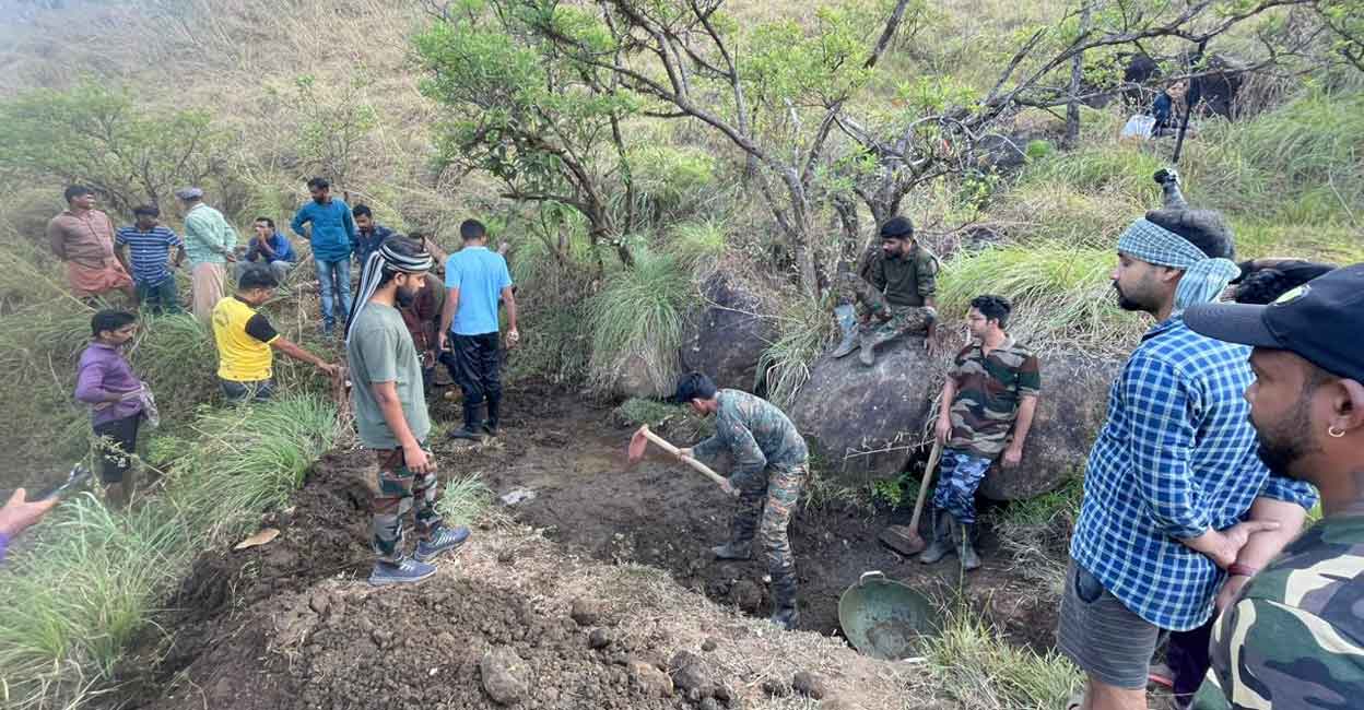 After working for around five hours, the 25-member team of 'Make My City Green' from Kannur built a watering hole for animals on the rocky terrain in Ranipuram, and secured it by building a fence around it. Photo: Special Arrangement