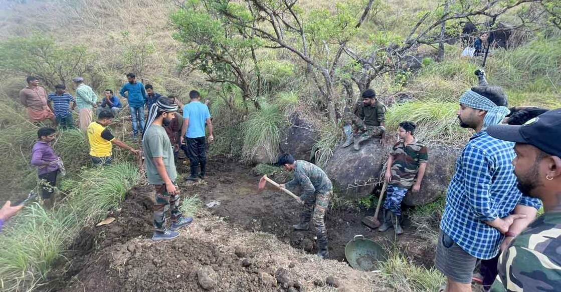 After working for around five hours, the 25-member team of 'Make My City Green' from Kannur built a watering hole for animals on the rocky terrain in Ranipuram, and secured it by building a fence around it. Photo: Special Arrangement