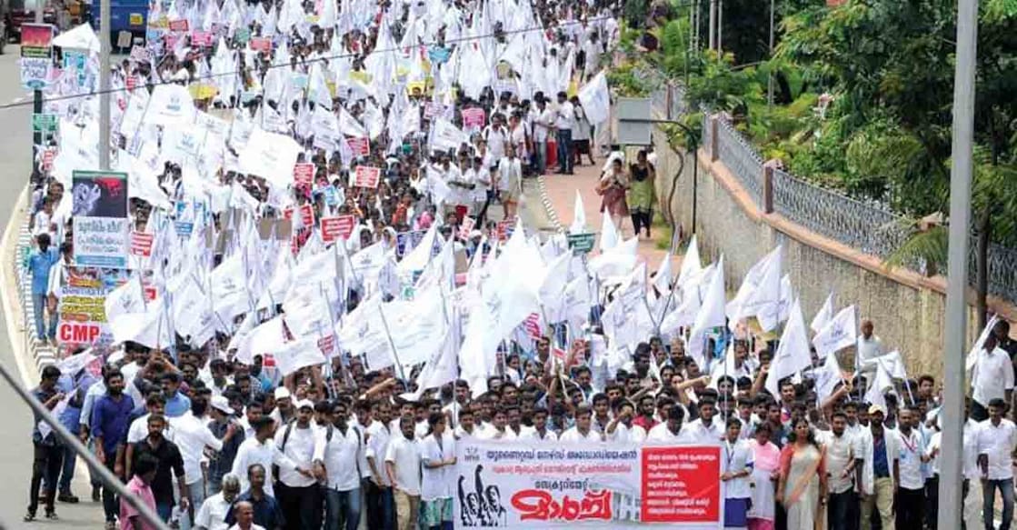 Nurses belonging to private hospitals in Kerala's Thrissur district protest against their low wages. Photo: Manorama News