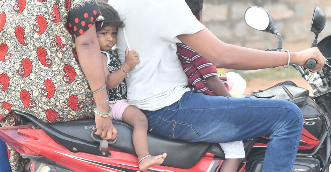A family riding on a two-wheeler. File photo: Manorama