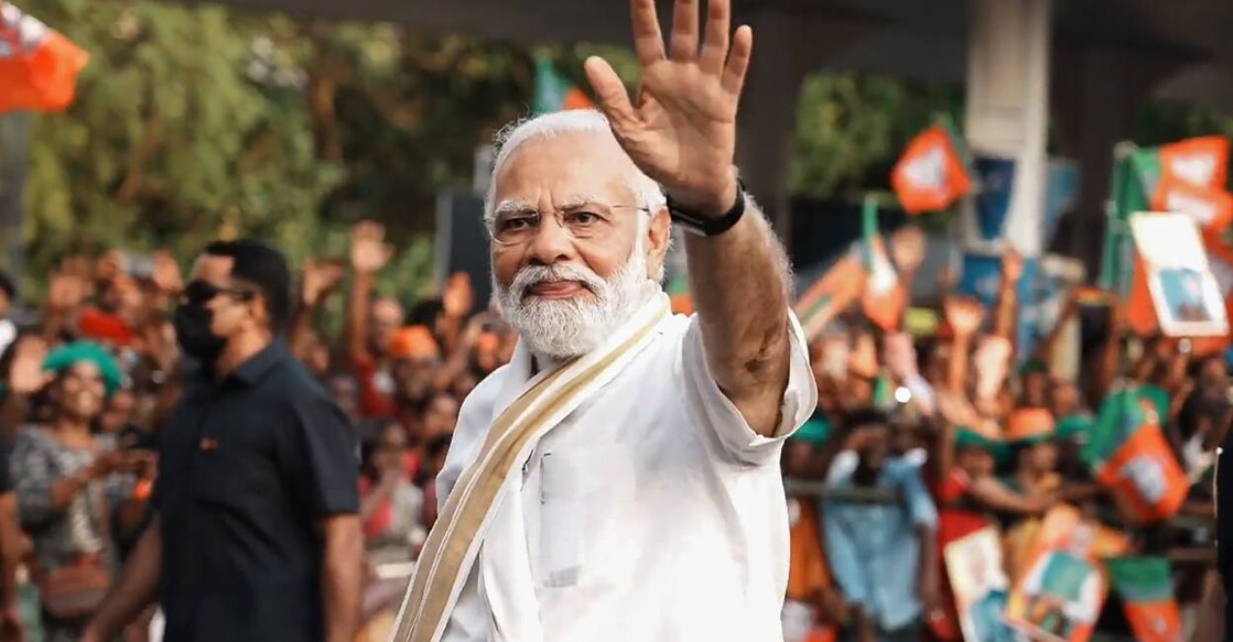 PM Modi greets people in Kochi on his earlier visit to Kerala. File Photo: PTI
