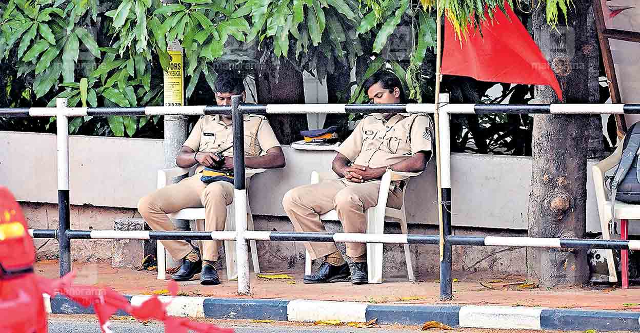Police stand guard in front of AKG Centre. Image: Manorama