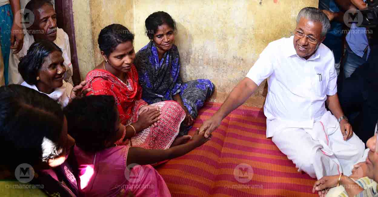Pinrayi Vijayan with Madhu's family Chief Minister Pinarayi Vijayan visits Madhu's family in 2018. File photo: Manorama