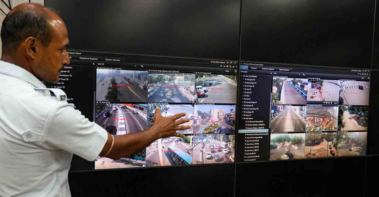 PTI05_07_2023_000159B A Kolkata Police personnel monitors vulnerable locations and river banks through CCTV footage in preparation for the landfall of Cyclone 'Mocha', at an integrated control room at Police Headquarters Lalbazar, in Kolkata, Sunday, May 7, 2023. Photo: Manorama