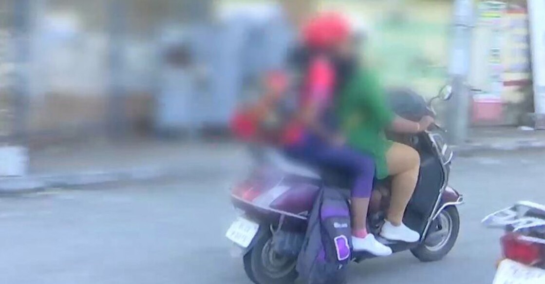 There have been persistent demands to exempt two-wheelers with three riders from being penalised when one of the riders is a child under 12 years of age.  Photo: Manorama News