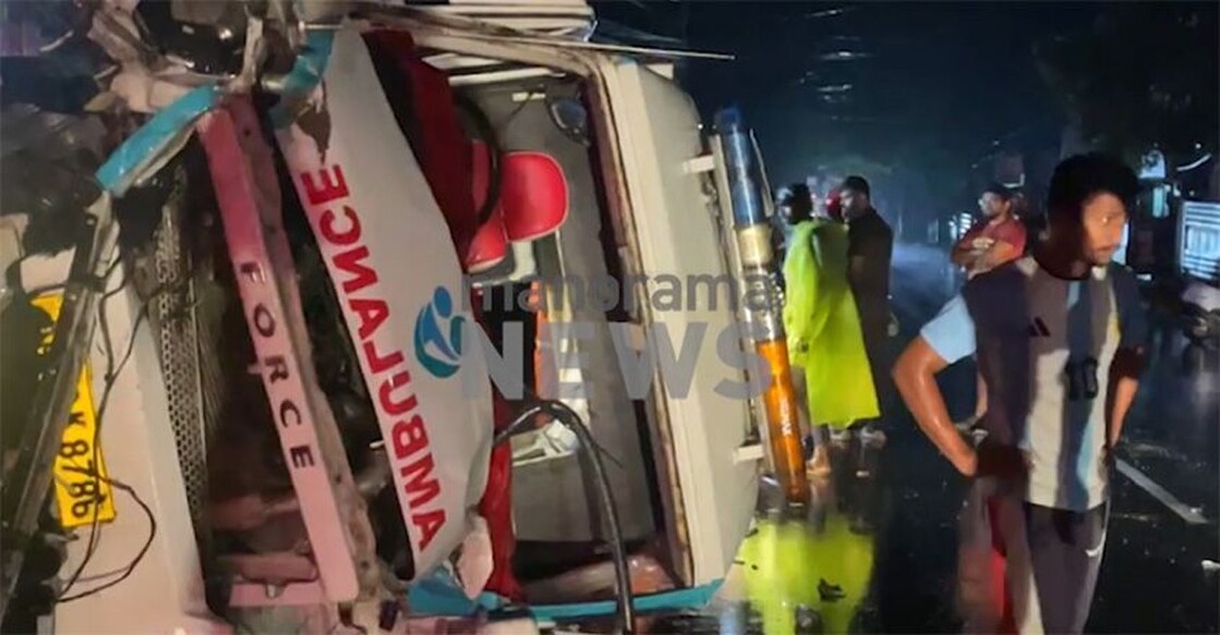 Ambulance overturned after crashing into a tree in Kunnamkulam. Photo: Screengrab/Manorama News