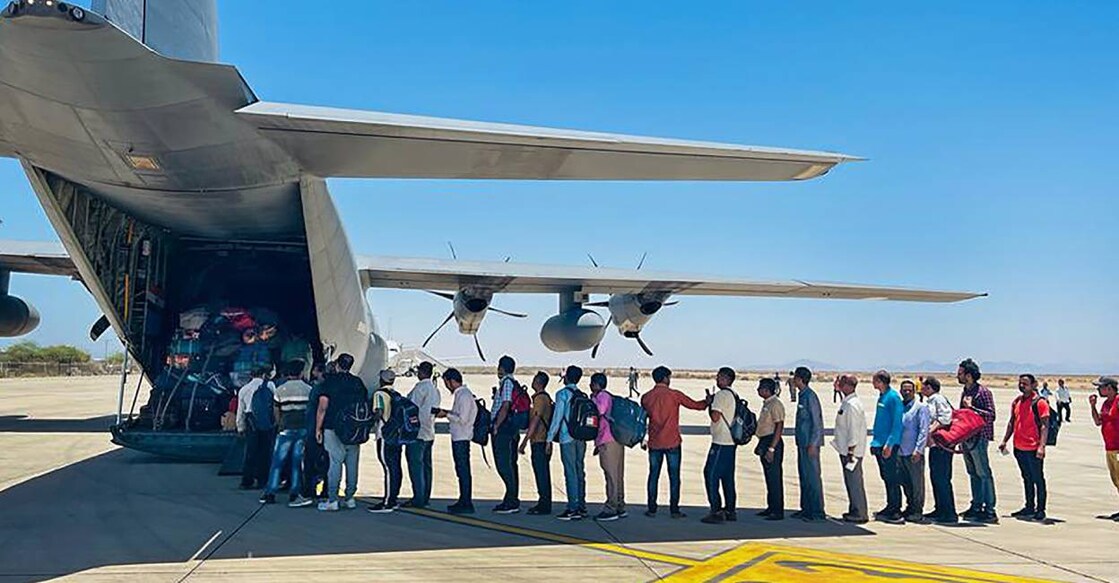 Operation Kaveri Indian nationals board an IAF C-130J aircraft, departing from Port Sudan as part of evacuation operations under Operation Kaveri. Photo: PTI