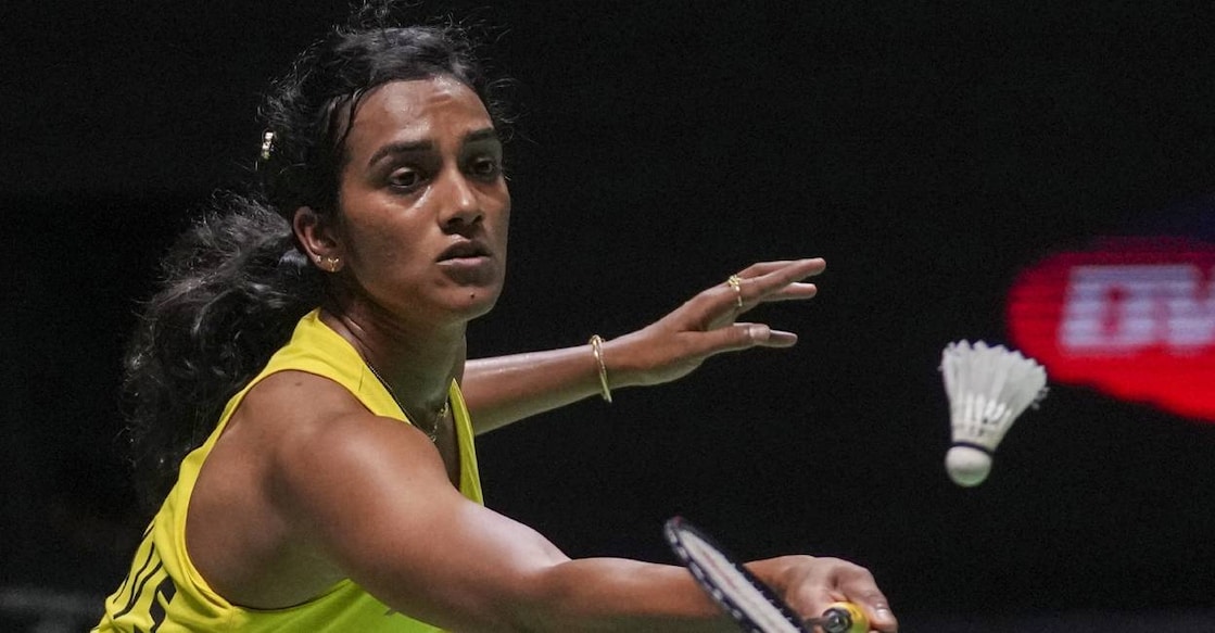 P V Sindhu plays against Gregoria Mariska Tunjung of Indonesia during their women's singles round of 32 match at Indonesia Open badminton tournament. Photo: AP