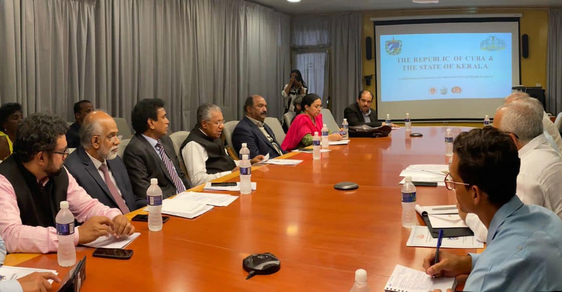 The Kerala delegation (left) holds discussions with representatives of Cuba. Photo: Facebook/@PinarayiVijayan