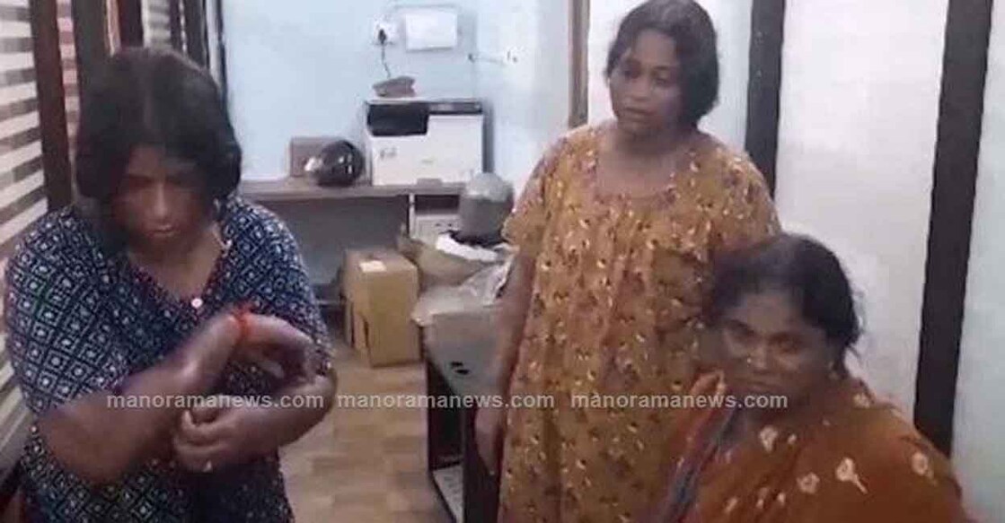 The three women after being taken into custody. Screengrab: Manorama News