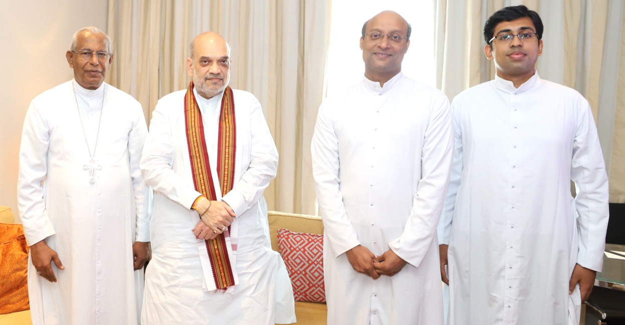 Union Home Minister with Mar Andrews Thazhath, Metropolitan Archbishop of Thrissur (left) in Kochi on Sunday. Photo: Twitter/@AmitShah