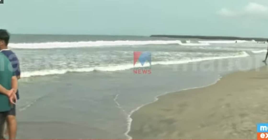 The children got trapped in the high tides while chasing their football that fell into the sea. Photo: Screengrab/ Manorama News