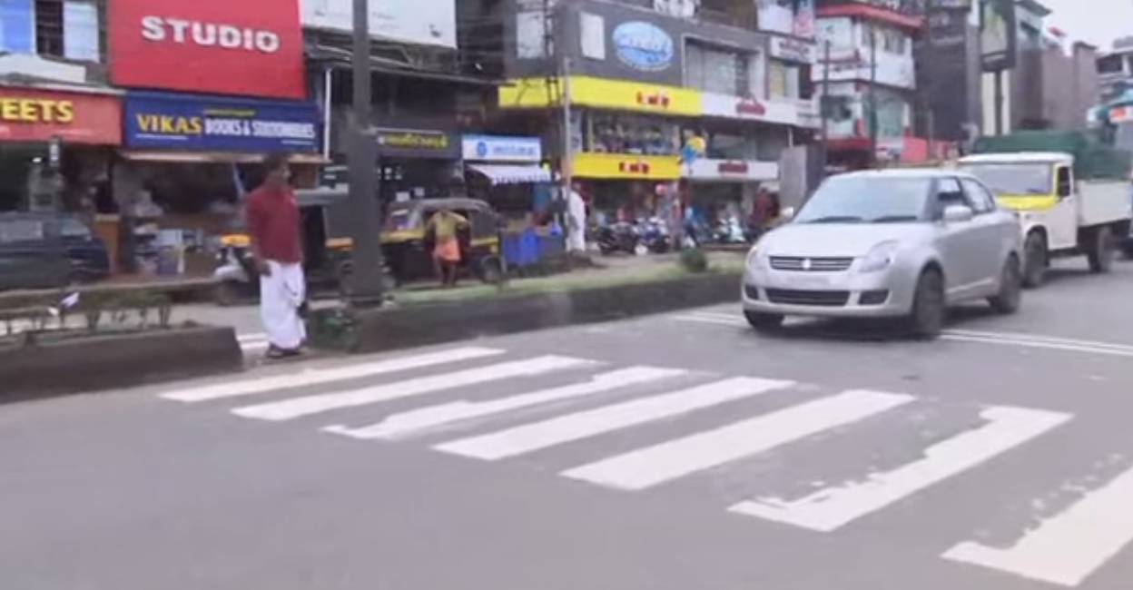 zebra crossing in Taliparamaba A plus two girl was hit by a speeding bike in Kannur's Taliparamaba on Monday. Photo: Manorama News
