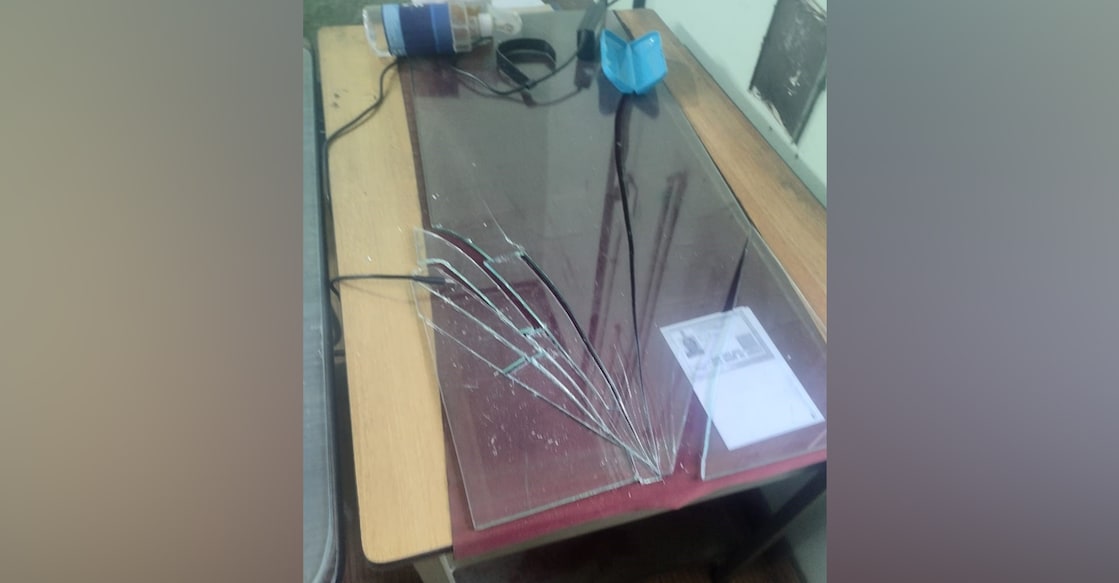 swtd-office-attack The glass surface of a table at the workstation of a woman official was allegedly smashed by protesters. Photo: Special arrangement