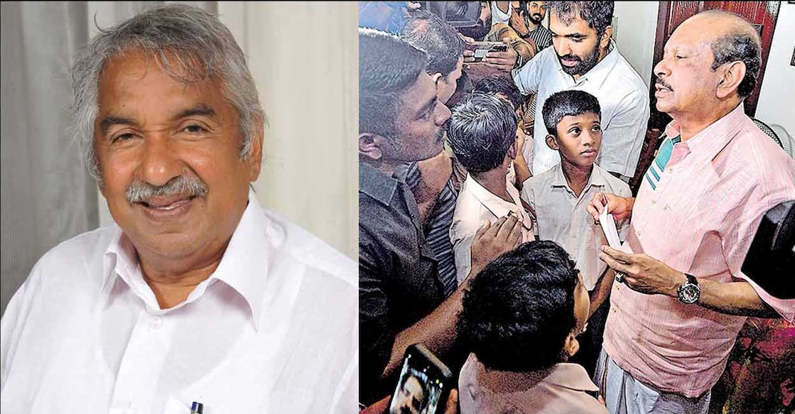 Oomen Chandy- Yusuff Ali 1. Oommen Chandy. 2. M A Yusuff Ali in Oommen Chandy's ancestral home talking to students of Government U P school who came to visit him. Photo: Manorama