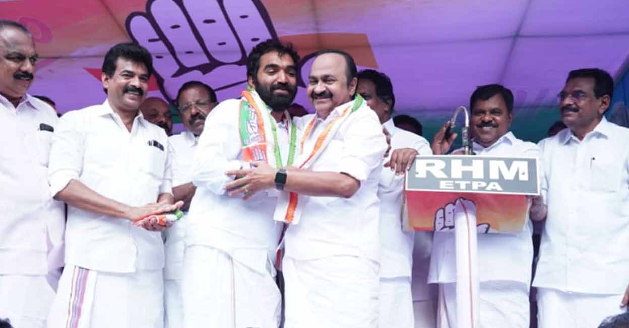 Chandy Oommen Chandy Oommen with leader of Opposition VD Satheesan during Puthuppally bypoll campaign. Photo: Special arrangement
