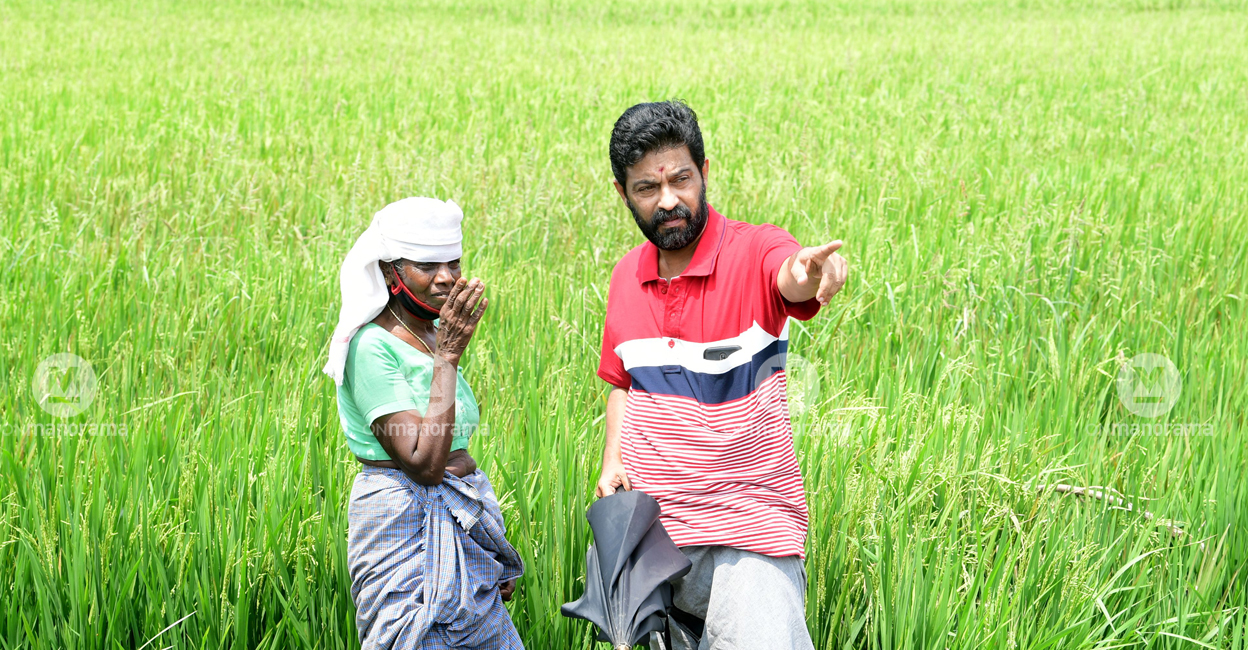 Actor Krishna Prasad in front of his paddy fields at Changanassery. File photo: Manorama