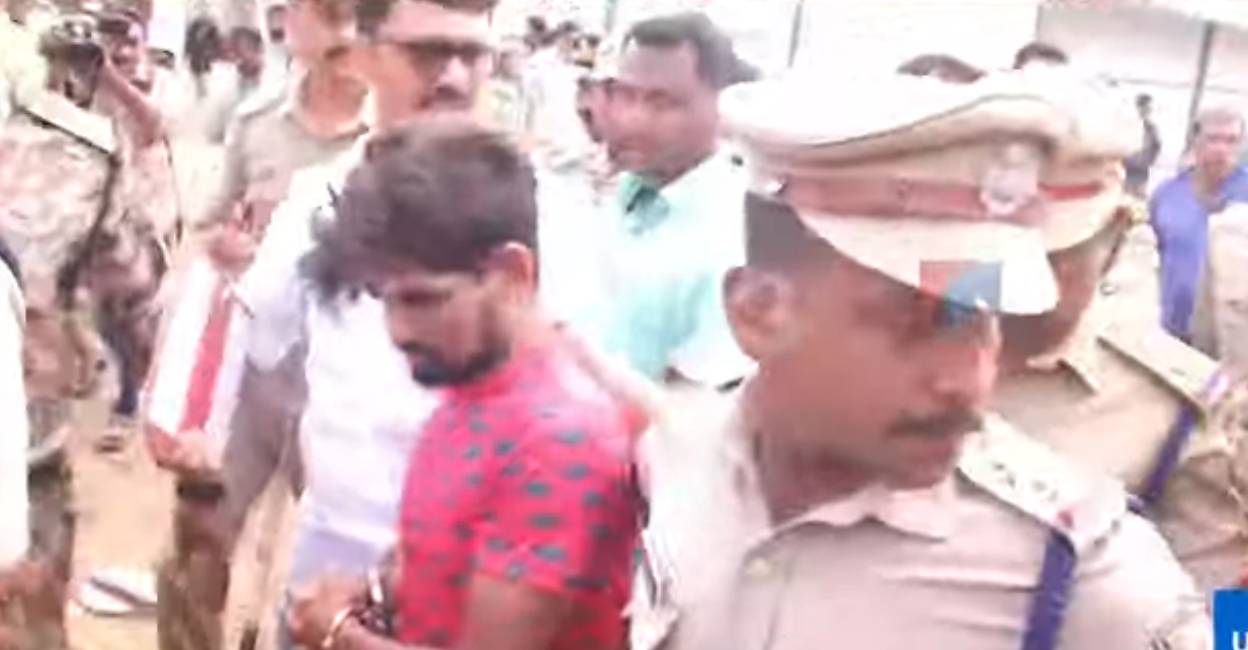 Asfaq Alam Police took Asfaq to Aluva market and recreated the crime scene. Photo: Manorama News/ Screengrab