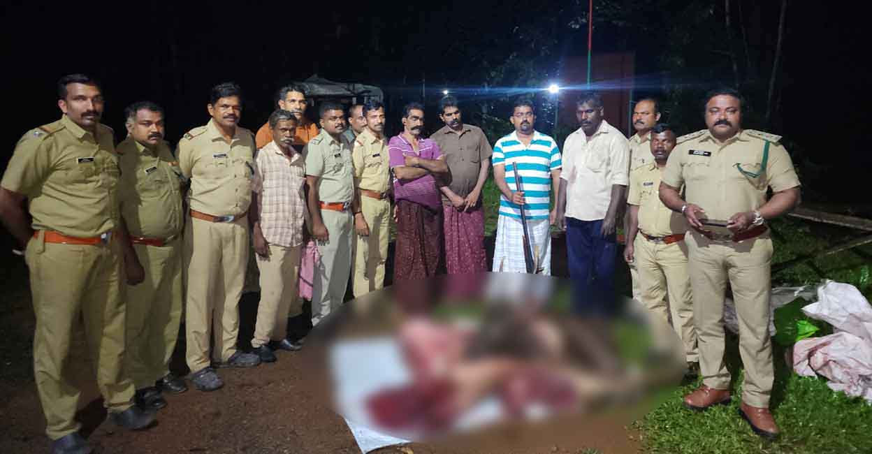 The arrested persons, meat, gun, and ammunition seized from them. Photo: Special arrangement