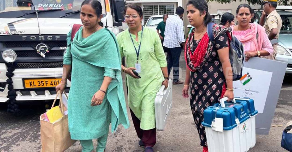 polling-puthuppally The distribution of polling materials commenced at the Baselius College, Kottayam, on Monday at 7 am. Photo: Manorama