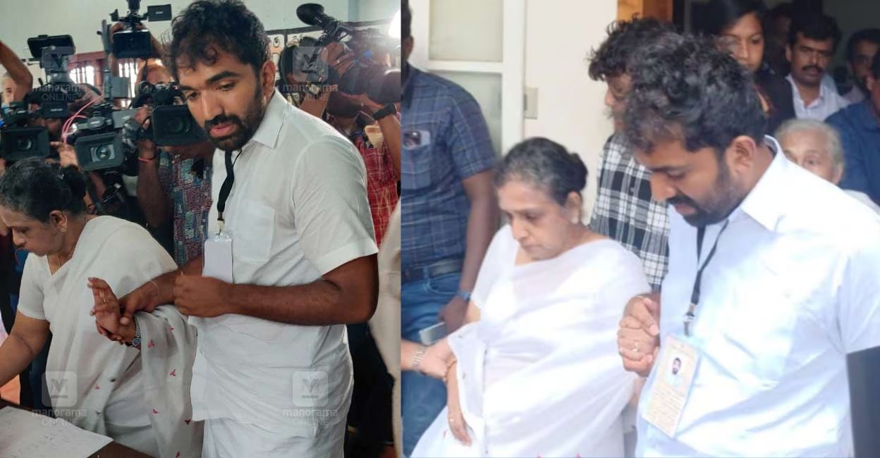 UDF candidate Chandy Oommen and mother Mariamma Oommen reach Puthuppally Georgian Public School to cast their vote. Photo: Rijo Joseph/Manorama