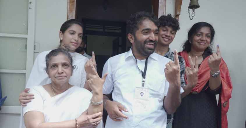Chandy Oommen Chandy Oommen cast his vote for the Puthuppally bypoll with his mother Mariyamma Oommen and sisters Achu and Maria. Photo: Special arrangement
