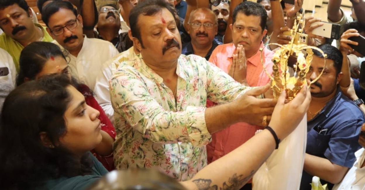Suresh Gopi places the crown on the statue of Mother Mary along with his wife Radhika and daughter Bhagya. Photo: Special Arrangement